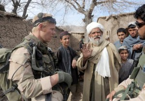 Dutch NATA troops in Afganistan talk to villagers