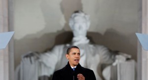 Obama speaking in front of a statue of Lincoln at the Lincoln Memorial