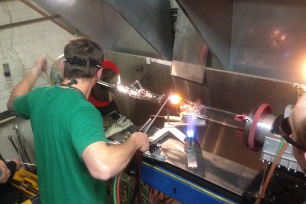 american worker making glass bongs