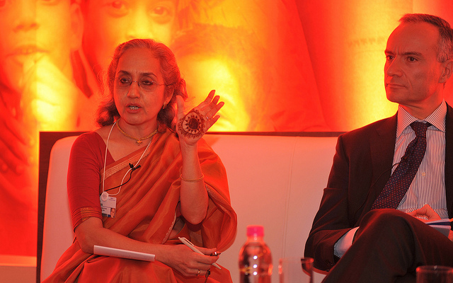 woman at indian economic summit showing cryptic drawing on her palm